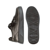 Bronze shoe with sole showing tread pattern on a white background