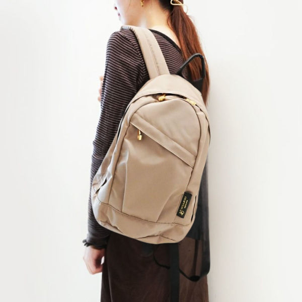Person wearing GINO Taupe backpack
