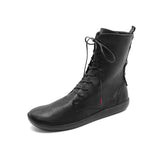 A single black pointed-toe ankle boot with a low kitten heel and a ribbed knit sock-like collar, shown from a side profile on a light gray background.
