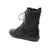 A black leather lace-up ankle boot with a low wedge heel, shown from a side-rear angle on a white background.