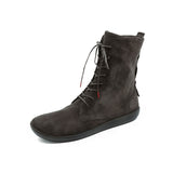 Black leather ankle boot on a white background