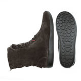 A pair of dark brown suede ankle boots shown from the side and the bottom, displaying the treaded sole with the 'Think!' brand logo embossed on it.
