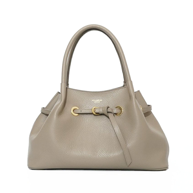 Beige handbag with gold accents on a white background