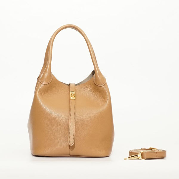 TreroBucket Cappucino Tan handbag with a matching strap on a white background